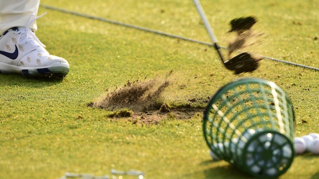 golf-shooting-beside-bucket