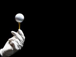 person-holding-tee-with-ball