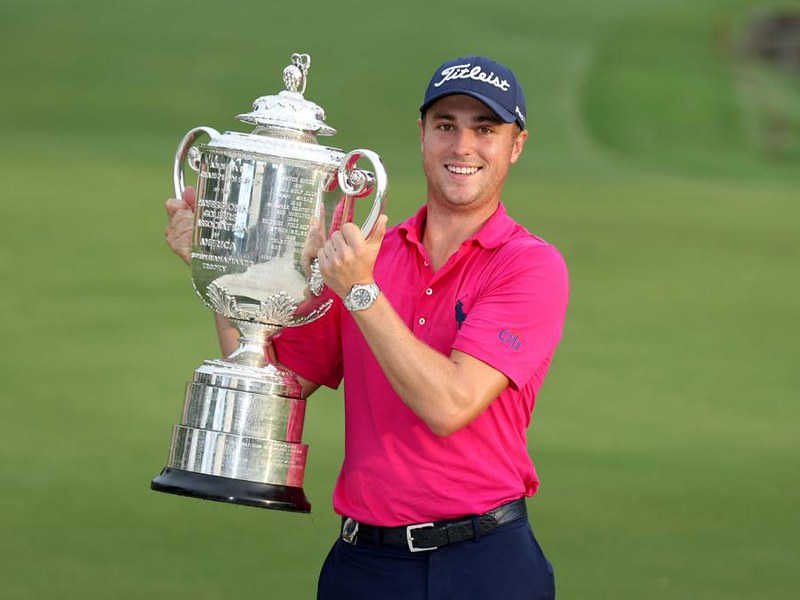 justin-thomas-holding-trophy