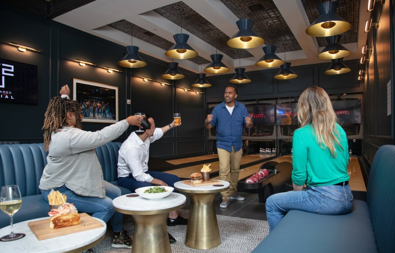 Discover the T-Squared Social, the new sports bar by Tiger Woods and Justin Timberlake at St. Andrews, blending heritage with vibrant entertainment.