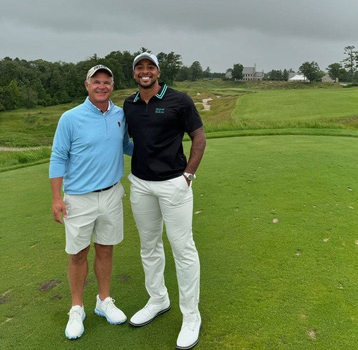 Explore AJ Dillon’s dynamic offseason, from Packers training to celebrity golf and cornhole events, showcasing his athletic range and engaging fan interactions.