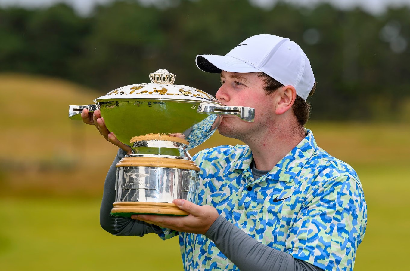 Discover how Robert MacIntyre’s win at the Genesis Scottish Open sets him up for the Open Championship at Royal Troon, amidst celebrations