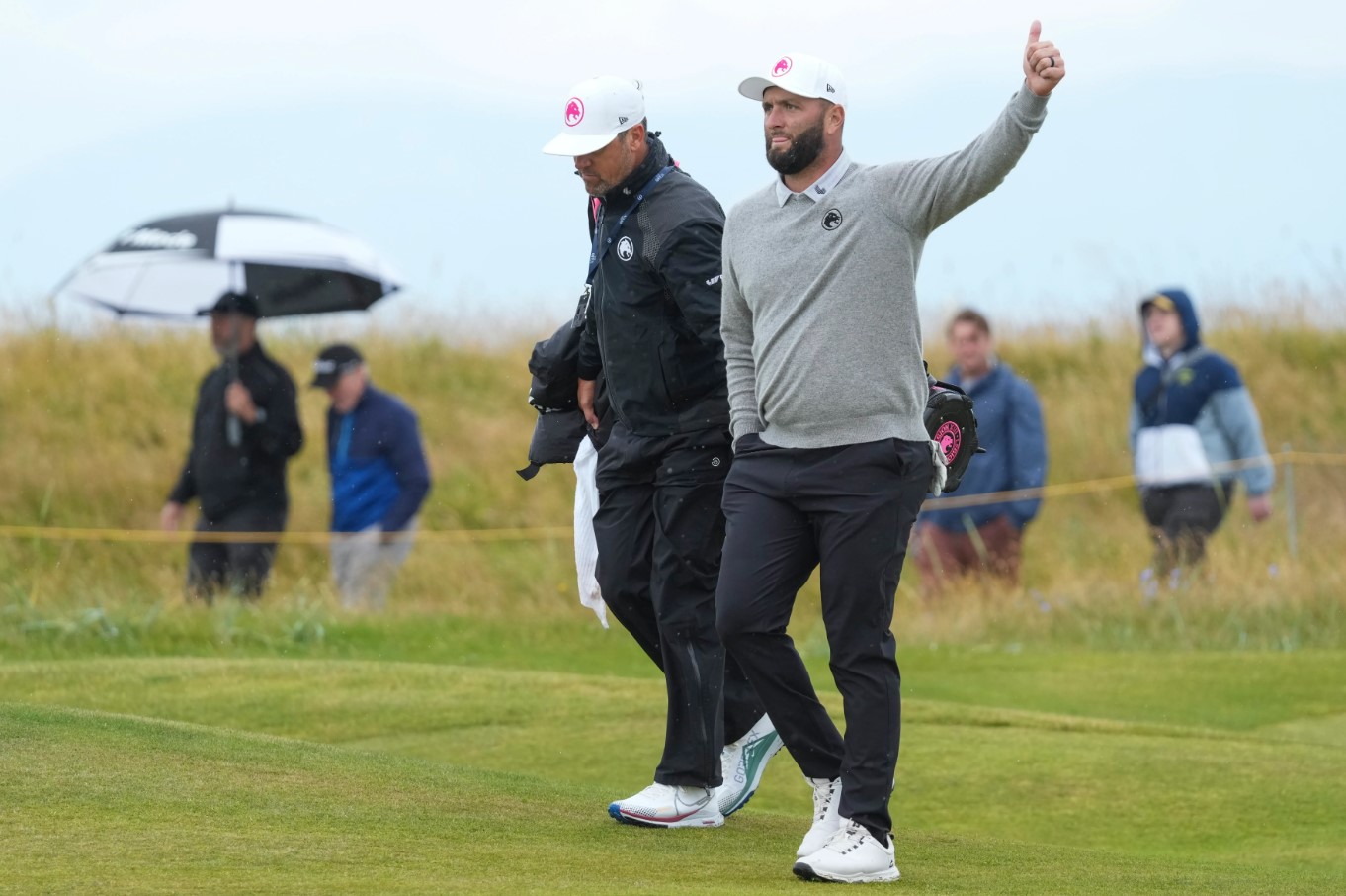 Explore Jon Rahm’s journey from overcoming a foot infection to aiming for victory at Royal Troon, amidst the drama of golf’s shifting landscapes.